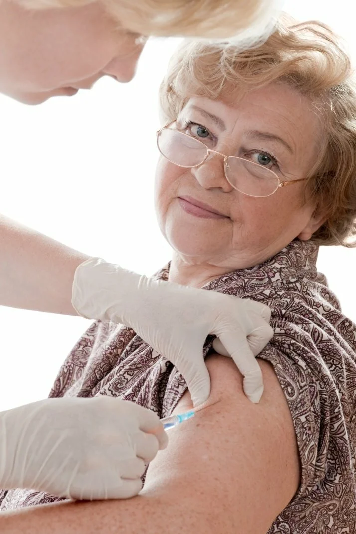 adult receiving vaccine