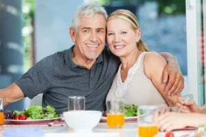 old couple eating healthy dinner