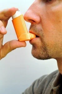 man with inhaler CanadianPharmacyMeds.ocm