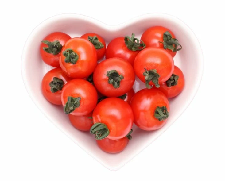 Heart shaped bowl of tomatoes CanadianPharmacyMeds.com