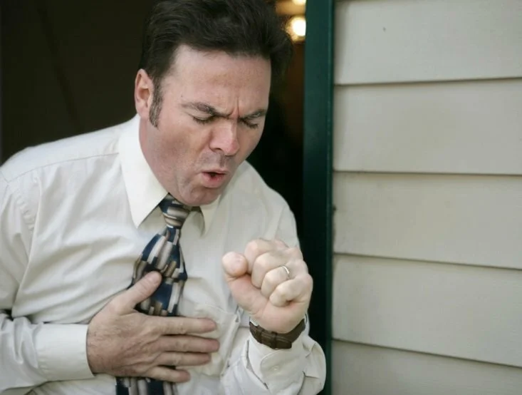 Man coughing CanadianPharmacyMeds.com