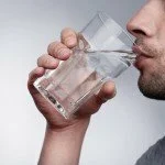 Man drinking water CanadianPharmacyMeds.com