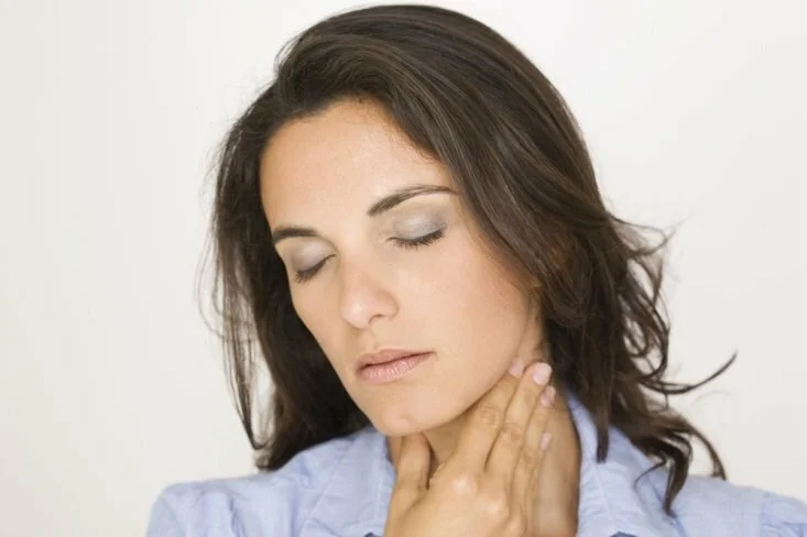 Women with pain in her throat CanadianPharmacyMeds.com