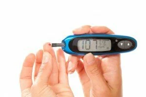 Person With Diabetes Checking Blood-Sugar Level CanadianPharmacyMeds.com