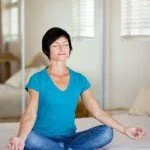 Woman relaxing to reduce stress CanadianPharmacyMeds.com