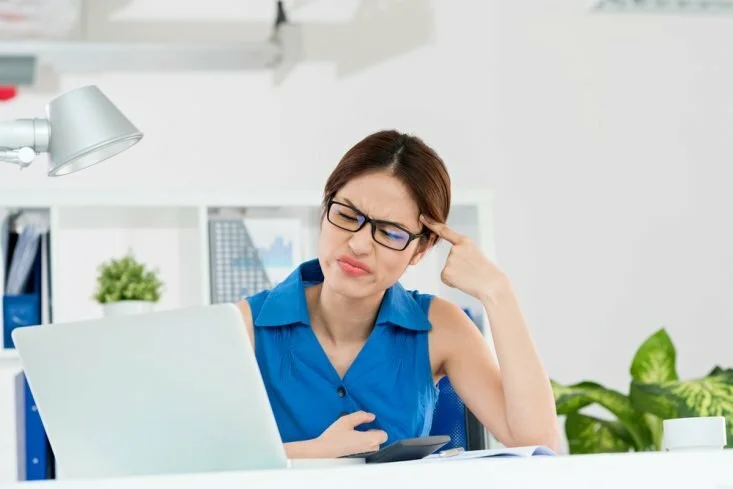 Woman trying to remember CanadianPharmacyMeds.com